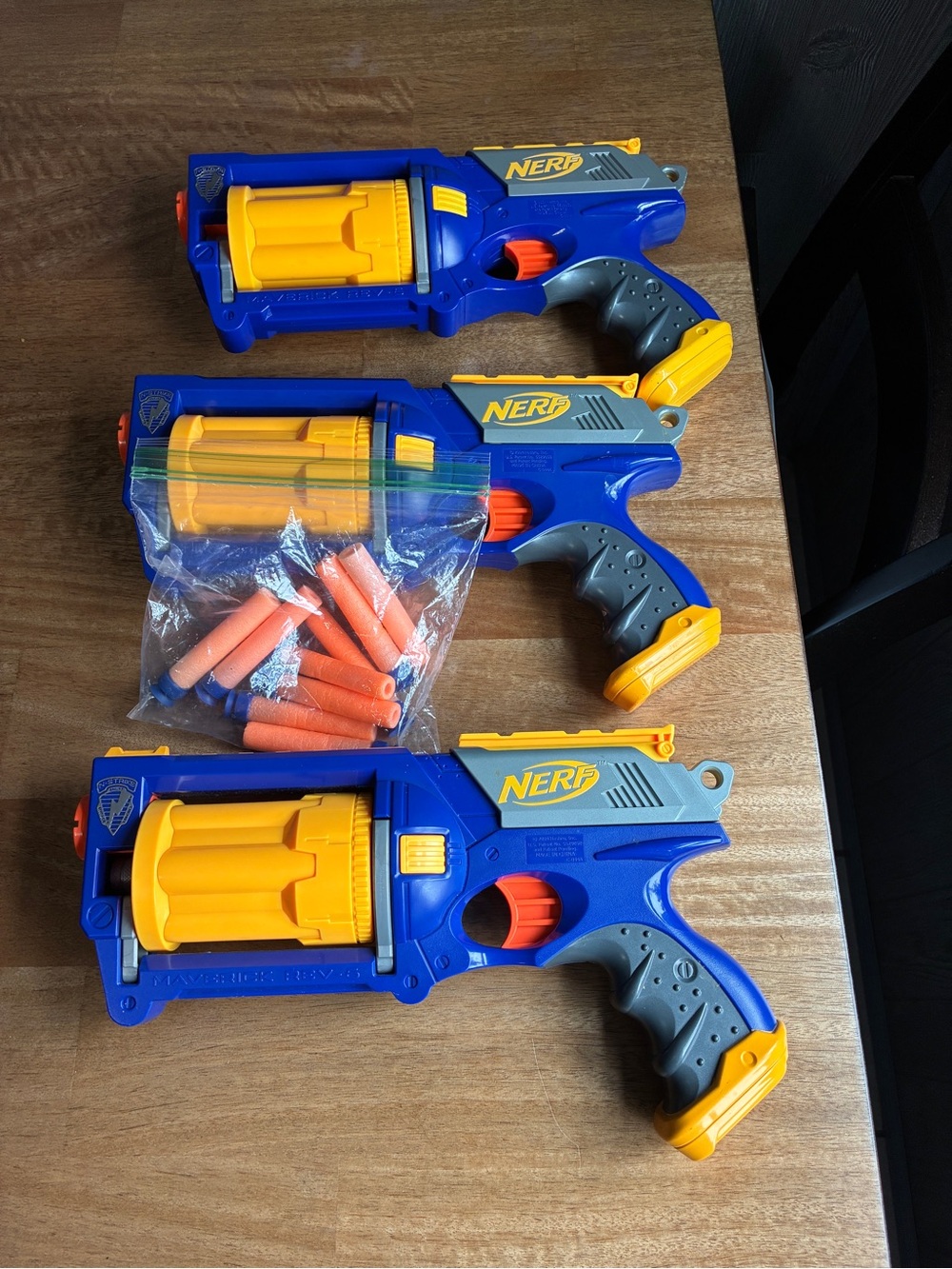 Nerf Blue Yellow and Orange 3-Pack Rotating Dart Blasters with Extra Darts
